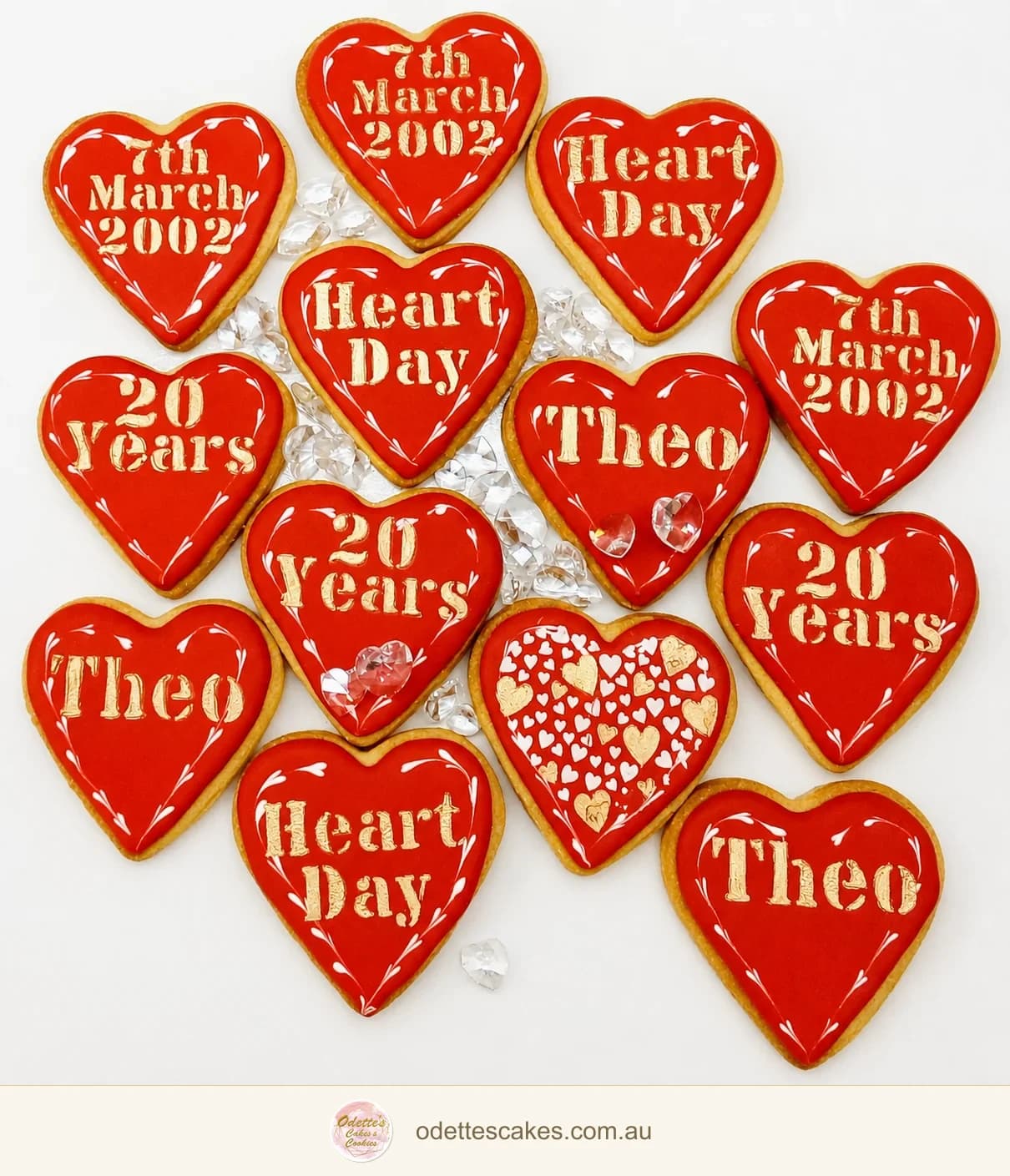 Red heart-shaped cookies with personalised white royal icing messages