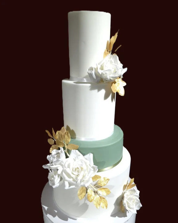 Congratulations to Damon and Donna who were wed at @ritzcarltonperth on Saturday 11th July 2026.
The cake was four tiers in sage and white, and featured hand crafted sugar flowers and gilded wafer paper leaves.
I hope you had a wonderful da